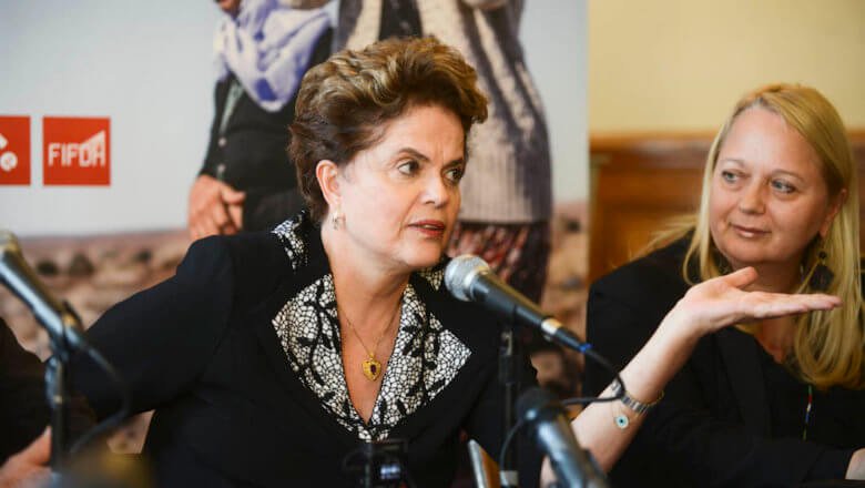 Em Lisboa, Dilma ironiza tarja preta em nome de Aécio Neves